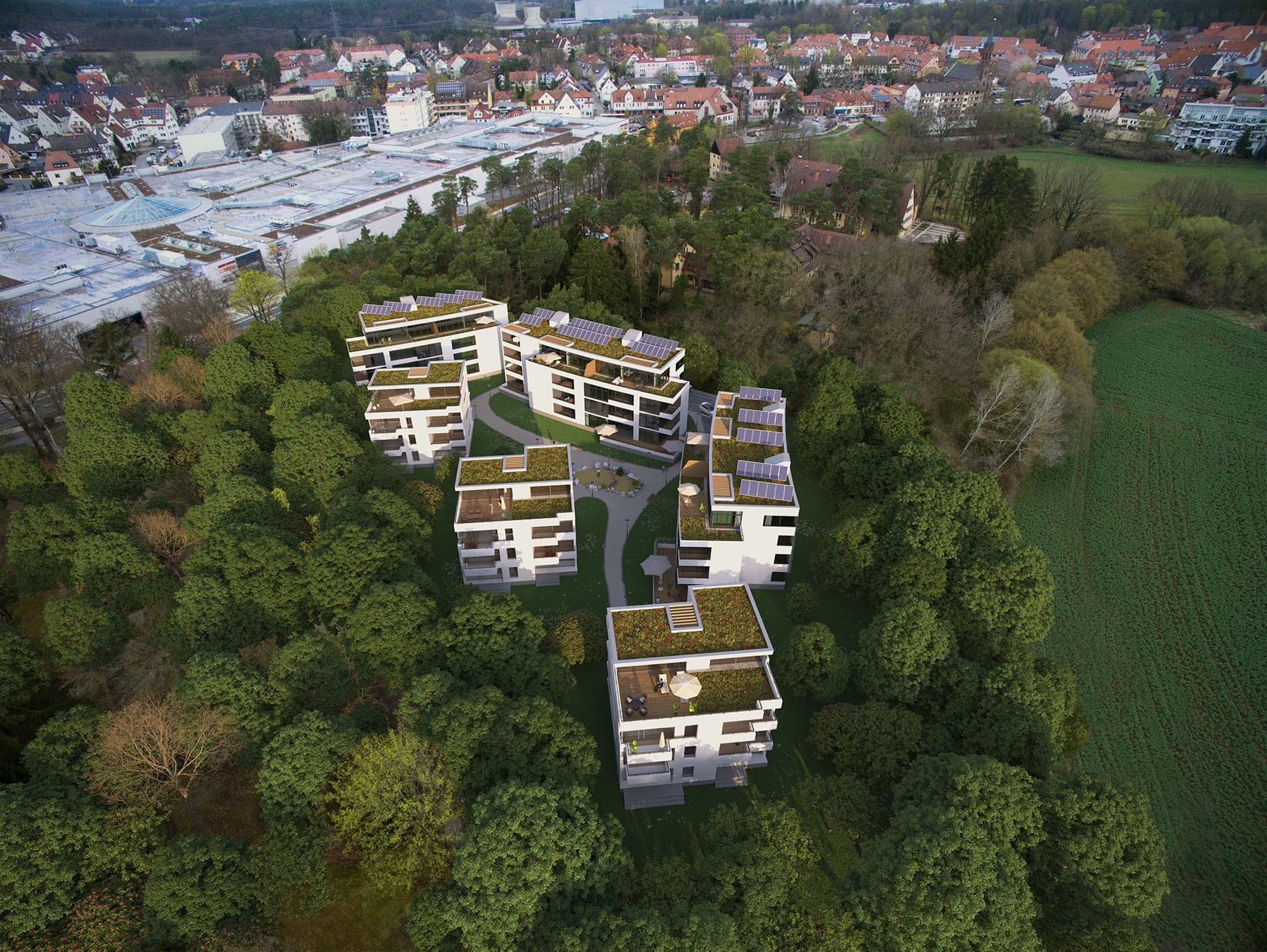 Wohnanlage am Wiesengrund in Stein bei Nürnberg, Luftbild-Visualisierung der sechs Baukörper im Baumbestand